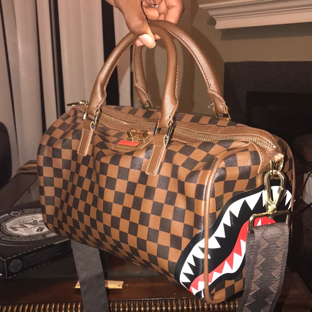 spray ground travel size duffel bag